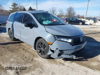 2023 Honda Odyssey Sport z VIN 5FNRL6H70PB022398, wystawiony jako IAAI lot #41434052 z przebiegiem Nie podano mil oraz . Historia ofert i sprzedaży dostępna na DreamBid. Obrazek 1.