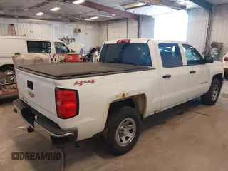 2014 Chevrolet Silverado 1500 Work Truck with VIN 3GCUKPEC0EG486576, listed as a IAAI auction lot 42222624 with 127,195 mi miles and . Bid and sale history available at DreamBid. Image 4.