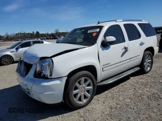 2010 GMC Yukon Denali with VIN 1GKUCEEF1AR226651, listed as a Copart auction lot 46990055 with 214,750 mi miles and Salvage Title. Bid and sale history available at carsss.com. Image 1.