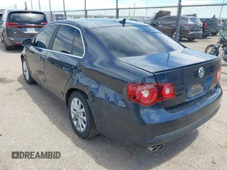 2010 Volkswagen Jetta Limited Edition with VIN 3VWRX7AJ1AM067933, listed as a IAAI auction lot 42153235 with 127,051 mi miles and . Bid and sale history available at DreamBid. Image 3.