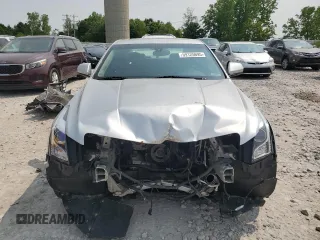 2013 Cadillac ATS z VIN 1G6AG5RXXD0125335, wystawiony jako Copart lot #59125695 z przebiegiem Nie podano mil oraz Czysty tytuł • Clean title. Historia ofert i sprzedaży dostępna na DreamBid. Obrazek 5.