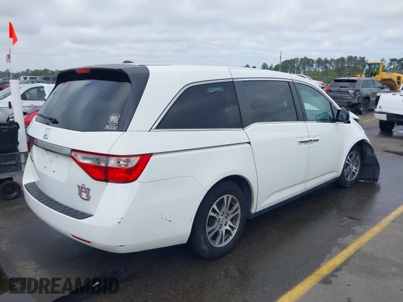 2012 Honda Odyssey EX-L with VIN 5FNRL5H60CB134954, listed as a IAAI auction lot 41942488 with 192,069 mi miles and . Bid and sale history available at DreamBid. Image 4.