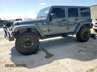 2014 Jeep Wrangler Unlimited Sahara z VIN 1C4BJWEG0EL104377, wystawiony jako Copart lot #56656765 z przebiegiem 135 210 mil mil oraz Szkoda całkowita • Salvage title. Historia ofert i sprzedaży dostępna na DreamBid. Obrazek 1.