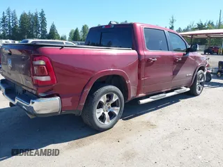 2019 Ram 1500 Laramie with VIN 1C6SRFJT2KN677400, listed as a IAAI auction lot 42441010 with 76,750 mi miles and . Bid and sale history available at DreamBid. Image 4.