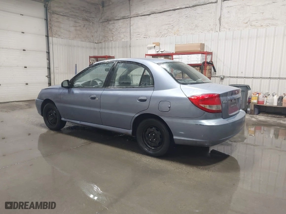 2003 Kia Rio with VIN KNADC125536274171, listed as a IAAI auction lot 41986369 with 59,837 mi miles. Bid and sale history available at carsss.com. Image 3.