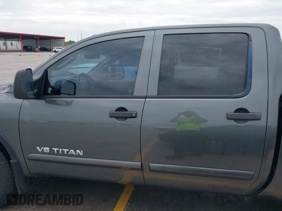 2010 Nissan Titan Pro-4X with VIN 1N6BA0EC9AN323943, listed as a IAAI auction lot 42795482 with 200,453 mi miles and . Bid and sale history available at DreamBid. Image 14.
