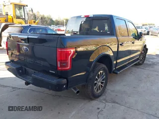 2018 Ford F-150 XL with VIN 1FTEW1EP7JFB77823, listed as a IAAI auction lot 40942694 with 163,078 mi miles. Bid and sale history available at carsss.com. Image 4.