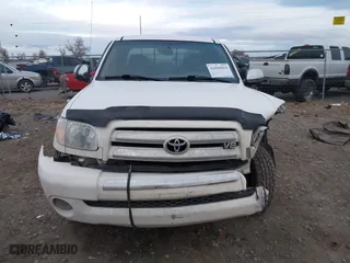 2005 Toyota Tundra SR5 with VIN 5TBBT44145S472290, listed as a IAAI auction lot 41030814 with 159,098 mi miles. Bid and sale history available at carsss.com. Image 12.