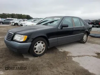 1995 Mercedes-Benz S 320 with VIN WDBGA32E5SA274778, listed as a Copart auction lot 45676305 with 102,942 mi miles and Salvage Title. Bid and sale history available at DreamBid. Image 1.
