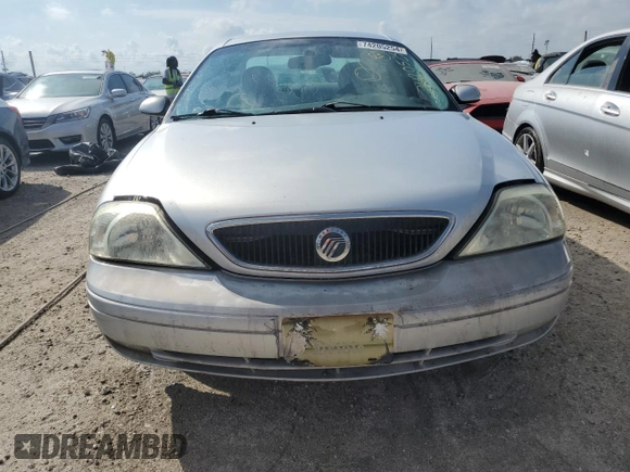 2002 Mercury Sable LS z VIN 1MEHM55SX2A619019, wystawiony jako Copart lot #74205254 z przebiegiem 71 677 mil mil oraz Szkody całkowita. Historia ofert i sprzedaży dostępna na DreamBid. Obrazek 5.