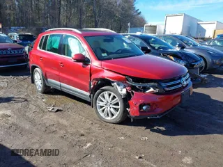 2016 Volkswagen Tiguan SEL z VIN WVGBV7AX8GW041753, wystawiony jako IAAI lot #41594991 z przebiegiem 71 264 mil mil oraz . Historia ofert i sprzedaży dostępna na DreamBid. Obrazek 1.