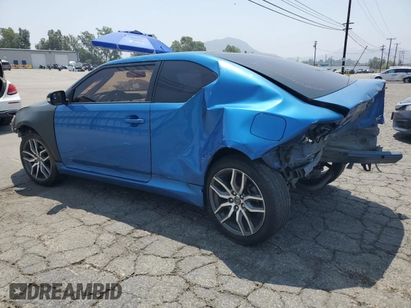 2014 Scion tC z VIN JTKJF5C72E3069652, wystawiony jako Copart lot #59791195 z przebiegiem 178 938 mil mil oraz Szkoda całkowita • Salvage title. Historia ofert i sprzedaży dostępna na DreamBid. Obrazek 2.