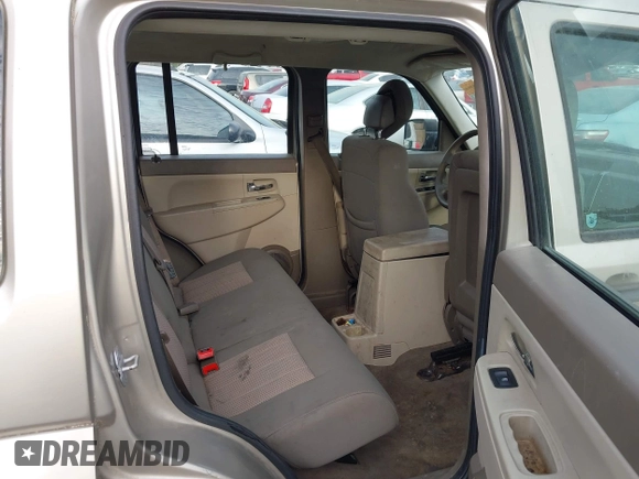 2010 Jeep Liberty Sport with VIN 1J4PN2GK0AW149679, listed as a IAAI auction lot 41874314 with 178,879 mi miles. Bid and sale history available at carsss.com. Image 8.