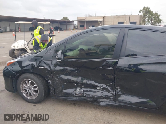 2022 Toyota Prius L Eco with VIN JTDKAMFU8N3188361, listed as a IAAI auction lot 41726369 with 48,517 mi miles and . Bid and sale history available at DreamBid. Image 6.