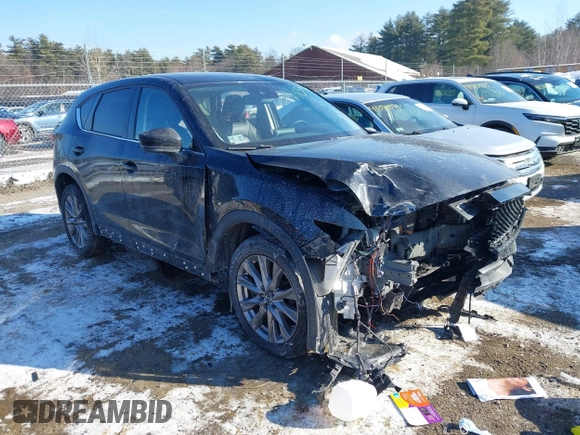 2020 Mazda CX-5 Grand Touring with VIN JM3KFBDM7L1807685, listed as a IAAI auction lot 41392313 with 91,729 mi miles and . Bid and sale history available at carsss.com. Image 1.