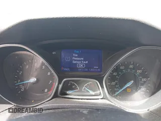 2013 Ford Focus SE with VIN 1FADP3K2XDL104907, listed as a IAAI auction lot 41952204 with 136,970 mi miles. Bid and sale history available at carsss.com. Image 7.