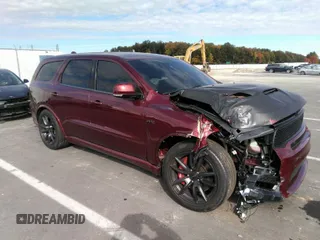 2018 Dodge Durango SRT with VIN 1C4SDJGJ5JC209669, listed as a IAAI auction lot 34590203 with 25,853 mi miles and . Bid and sale history available at carsss.com. Image 1.