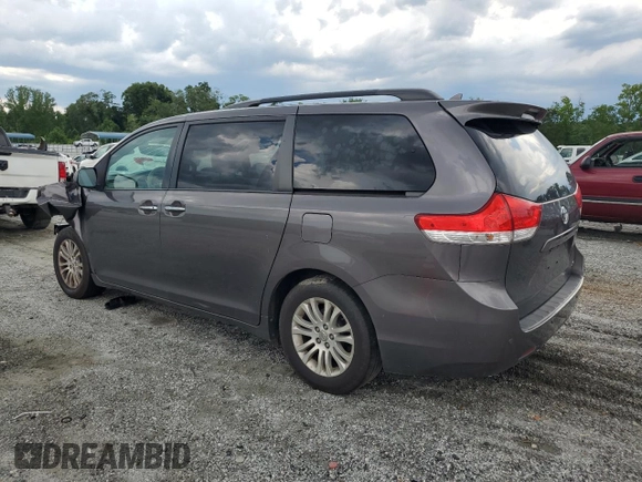 2012 Toyota Sienna XLE AAS with VIN 5TDYK3DC0CS251735, listed as a Copart auction lot 62208805 with 217,504 mi miles and Clean title. Bid and sale history available at DreamBid. Image 2.