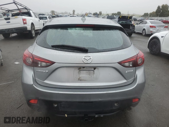 2014 Mazda 3 i Grand Touring with VIN JM1BM1M74E1106463, listed as a Copart auction lot 85144434 with 122,729 mi miles and Salvage Title. Bid and sale history available at DreamBid. Image 6.