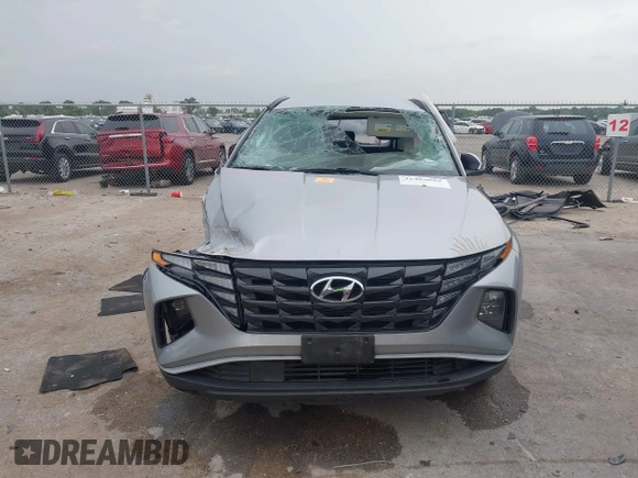 2023 Hyundai Tucson SEL with VIN 5NMJBCAE9PH173732, listed as a IAAI auction lot 42408802 with 37,378 mi miles and . Bid and sale history available at DreamBid. Image 12.