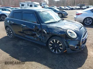 2017 MINI Hardtop 4 Door Cooper S z VIN WMWXU3C39H2F48699, wystawiony jako IAAI lot #41924423 z przebiegiem 81 249 mil mil oraz . Historia ofert i sprzedaży dostępna na DreamBid. Obrazek 1.