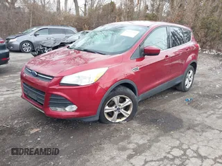 2013 Ford Escape SE with VIN 1FMCU0GX6DUC50924, listed as a IAAI auction lot 41673513 with 127,250 mi miles and . Bid and sale history available at DreamBid. Image 2.
