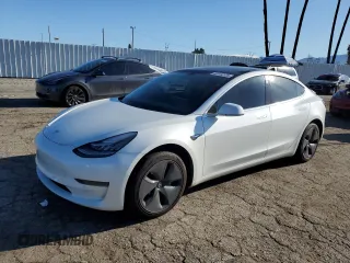 2020 Tesla Model 3 Standard Range Plus with VIN 5YJ3E1EA5LF660417, listed as a Copart auction lot 48144125 with 112,924 mi miles and Salvage Title. Bid and sale history available at DreamBid. Image 1.