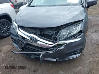 2018 Honda Odyssey EX-L z VIN 5FNRL6H74JB043276, wystawiony jako IAAI lot #42326742 z przebiegiem 126 025 mil mil oraz . Historia ofert i sprzedaży dostępna na DreamBid. Obrazek 6.
