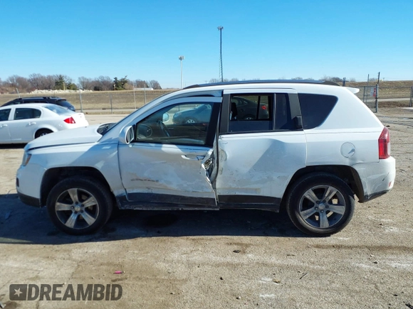2016 Jeep Compass High Altitude Edition with VIN 1C4NJCEA8GD676091, listed as a IAAI auction lot 41447387 with 120,881 mi miles. Bid and sale history available at carsss.com. Image 14.