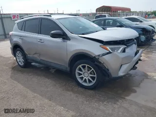 2018 Toyota RAV4 LE with VIN 2T3ZFREV2JW464807, listed as a IAAI auction lot 40966277 with 113,053 mi miles. Bid and sale history available at carsss.com. Image 1.