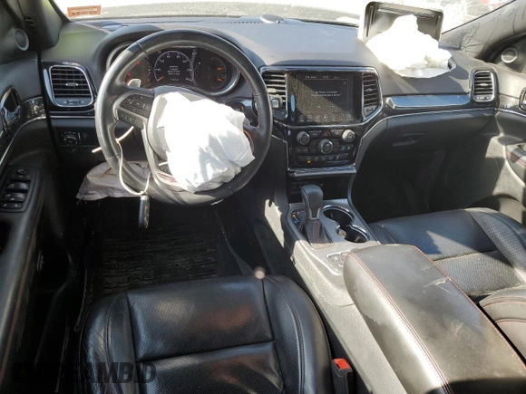 2019 Jeep Grand Cherokee Trailhawk with VIN 1C4RJFLG6KC838275, listed as a Copart auction lot 53002185 with 77,597 mi miles and Salvage title. Bid and sale history available at DreamBid. Image 8.