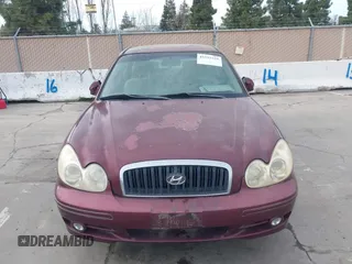 2004 Hyundai Sonata with VIN KMHWF25S84A040837, listed as a IAAI auction lot 41591528 with 76,606 mi miles. Bid and sale history available at carsss.com. Image 6.
