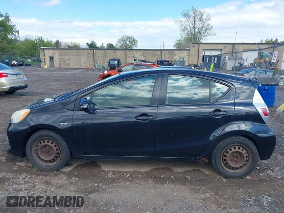 2013 Toyota Prius One z VIN JTDKDTB36D1034028, wystawiony jako IAAI lot #42172387 z przebiegiem 245 325 mil mil oraz . Historia ofert i sprzedaży dostępna na DreamBid. Obrazek 14.