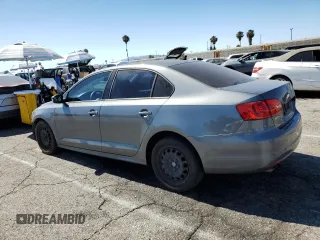 2014 Volkswagen Jetta SE with VIN 3VWD17AJ2EM322087, listed as a Copart auction lot 62571155 with 71,884 mi miles and Salvage title. Bid and sale history available at DreamBid. Image 2.