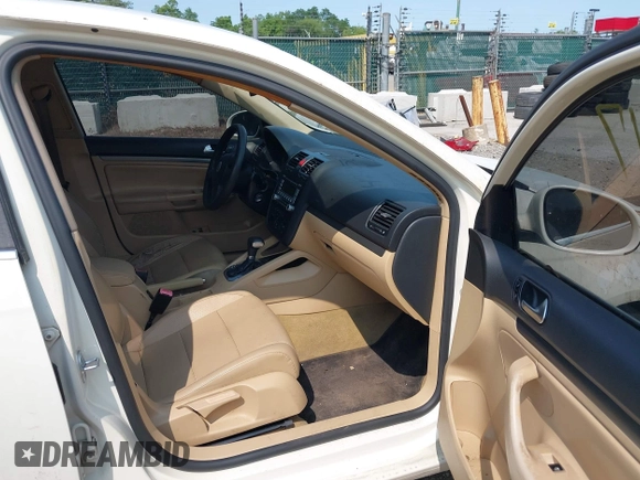 2007 Volkswagen Jetta 2.5 z VIN 3VWRG71K77M062978, wystawiony jako IAAI lot #42415517 z przebiegiem 168 159 mil mil oraz . Historia ofert i sprzedaży dostępna na DreamBid. Obrazek 5.