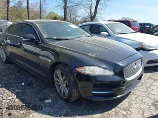 2013 Jaguar XJ Portfolio with VIN SAJWJ2GD0D8V49329, listed as a IAAI auction lot 41829426 with 125,584 mi miles and . Bid and sale history available at DreamBid. Image 1.