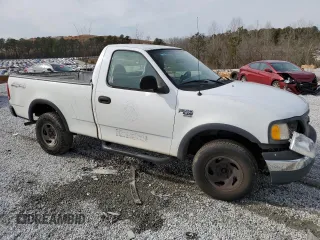 2003 Ford F-150 XL z VIN 1FTRF18W53NB45997, wystawiony jako Copart lot #42451525 z przebiegiem 149 166 mil mil oraz Szkoda całkowita • Salvage title. Historia ofert i sprzedaży dostępna na DreamBid. Obrazek 4.