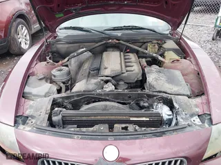 2004 BMW Z4 2.5i with VIN 4USBT33544LS50607, listed as a IAAI auction lot 41673776 with 156,585 mi miles. Bid and sale history available at carsss.com. Image 10.