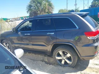 2014 Jeep Grand Cherokee Overland with VIN 1C4RJECG8EC409976, listed as a IAAI auction lot 41821685 with 186,105 mi miles. Bid and sale history available at carsss.com. Image 14.
