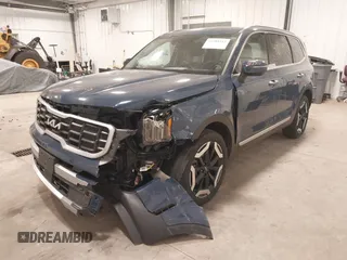 2023 Kia Telluride S with VIN 5XYP6DGC1PG348835, listed as a IAAI auction lot 41985119 with 34,701 mi miles and . Bid and sale history available at DreamBid. Image 2.