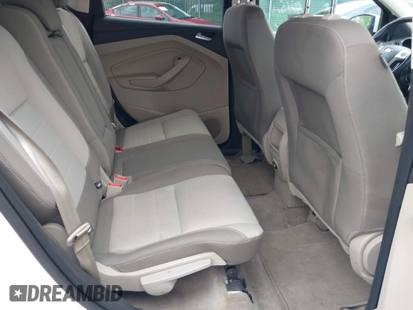 2014 Ford Escape SE with VIN 1FMCU9GX9EUC61521, listed as a IAAI auction lot 42535244 with 129,315 mi miles and . Bid and sale history available at DreamBid. Image 8.