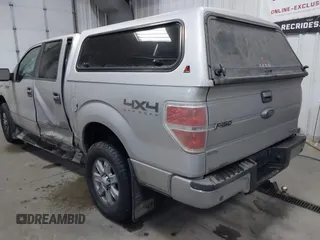 2014 Ford F-150 XL with VIN 1FTFW1EFXEFB69619, listed as a IAAI auction lot 41360500 with 196,708 mi miles and . Bid and sale history available at carsss.com. Image 3.