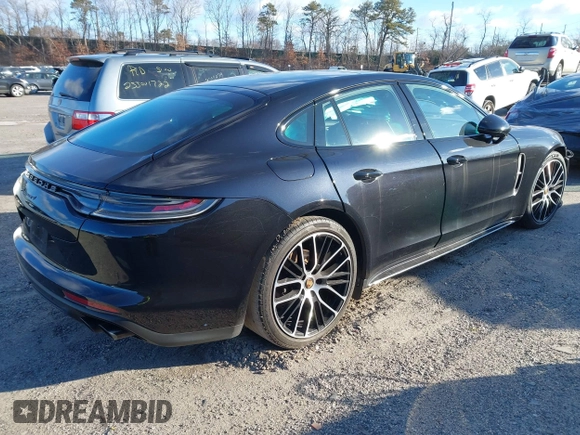 2023 Porsche Panamera with VIN WP0AJ2A77PL100226, listed as a IAAI auction lot 41554538 with 52,257 mi miles and . Bid and sale history available at DreamBid. Image 4.