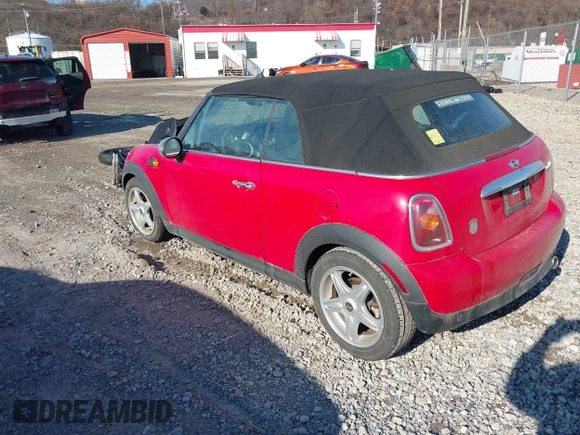 2010 MINI Convertible with VIN WMWMR3C59ATU97398, listed as a IAAI auction lot 41714054 with 12,663 mi miles and . Bid and sale history available at DreamBid. Image 3.