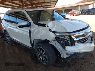 2019 Honda Pilot Touring 7-Passenger with VIN 5FNYF6H63KB074028, listed as a IAAI auction lot 42256209 with Not provided miles and . Bid and sale history available at DreamBid. Image 1.