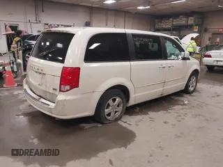 2012 Dodge Grand Caravan SXT with VIN 2C4RDGCG3CR405373, listed as a IAAI auction lot 41264407 with 164,019 mi miles and . Bid and sale history available at DreamBid. Image 4.