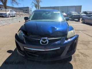 2011 Mazda CX-7 i SV with VIN JM3ER2A51B0354735, listed as a Copart auction lot 50057095 with 140,764 mi miles and Salvage Title. Bid and sale history available at carsss.com. Image 5.