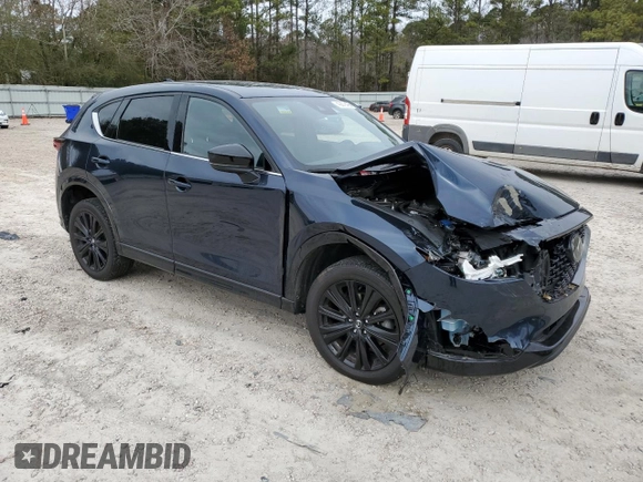 2022 Mazda CX-5 2.5 Turbo with VIN JM3KFBAY3N0603921, listed as a Copart auction lot 43679495 with 27,073 mi miles and Salvage Title. Bid and sale history available at carsss.com. Image 4.