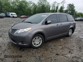 2015 Toyota Sienna XLE with VIN 5TDYK3DC2FS688334, listed as a Copart auction lot 56770885 with 74,516 mi miles and Salvage title. Bid and sale history available at DreamBid. Image 1.