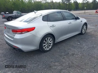 2018 Kia Optima EX with VIN 5XXGU4L34JG237557, listed as a IAAI auction lot 42000008 with 128,694 mi miles and . Bid and sale history available at carsss.com. Image 4.